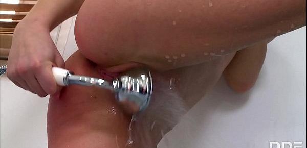  Busty teen Viola splashes water all over her delicious clit in the bath tub